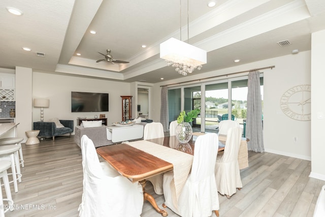 195 Glen Valley Dr, Ponte Vedra, FL 32081 - dining room featuring a tray ceiling, crown molding, light wood-type flooring, ceiling fan, and recessed lighting