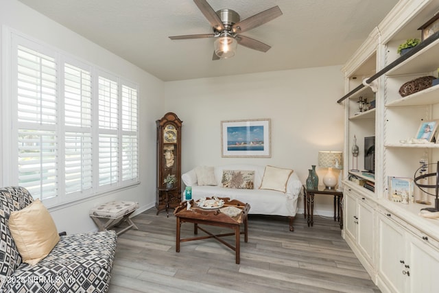 195 Glen Valley Dr, Ponte Vedra, FL 32081 - living room featuring a ceiling fan, light wood-style floors, a textured ceiling, and baseboards