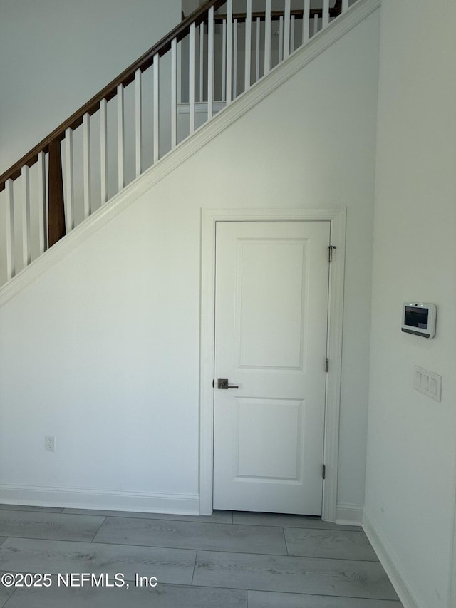 35 Mahogany Way, Palm Coast, FL 32164 - staircase with wood-type flooring