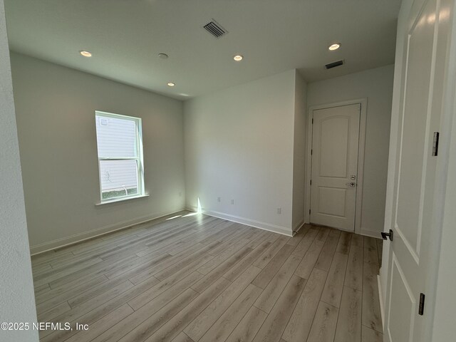 35 Mahogany Way, Palm Coast, FL 32164 - unfurnished bedroom with light hardwood / wood-style flooring