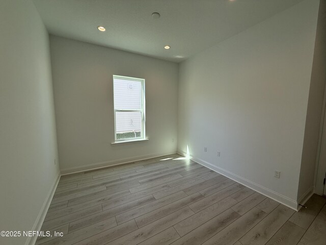 35 Mahogany Way, Palm Coast, FL 32164 - empty room featuring light hardwood / wood-style floors