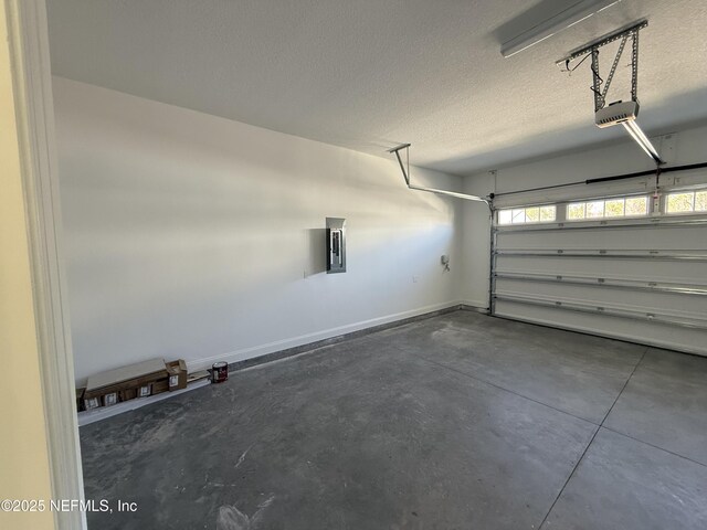 35 Mahogany Way, Palm Coast, FL 32164 - garage with a garage door opener and electric panel