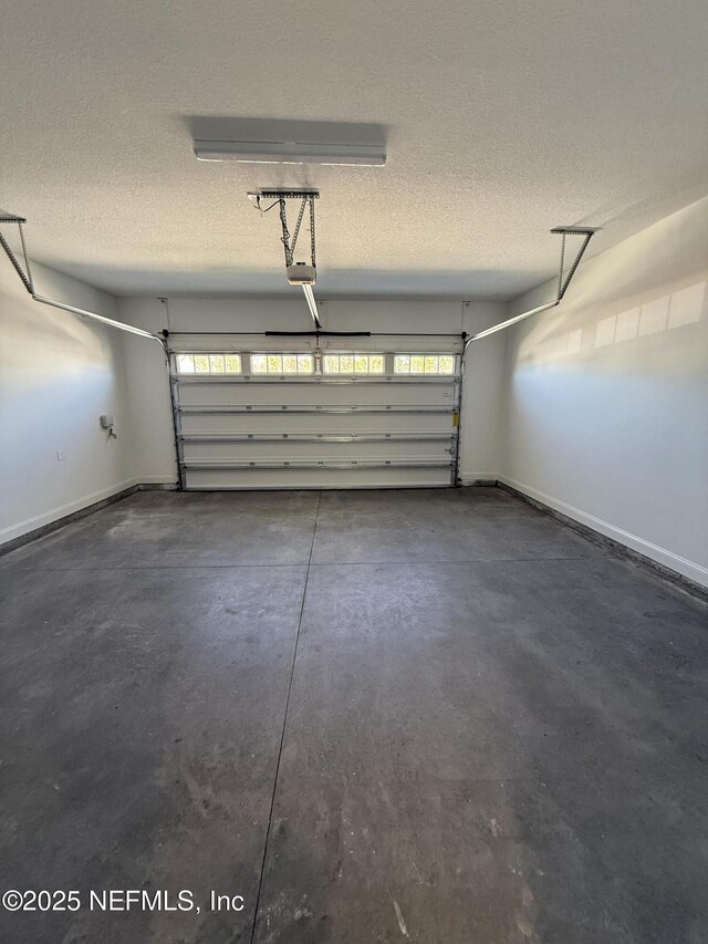 35 Mahogany Way, Palm Coast, FL 32164 - garage featuring a garage door opener