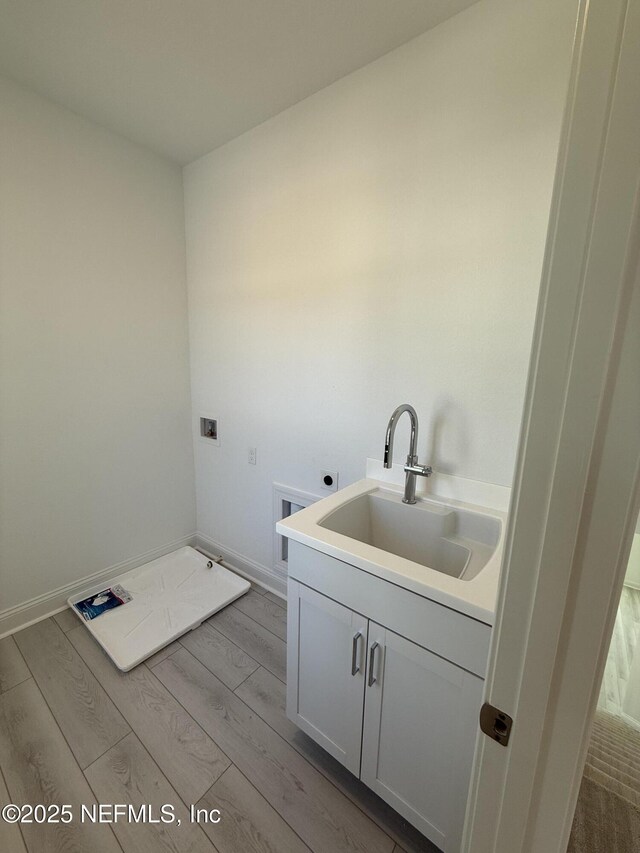 35 Mahogany Way, Palm Coast, FL 32164 - bathroom with hardwood / wood-style flooring and vanity
