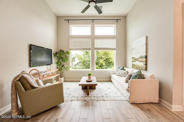 11484 Gully Ct, Jacksonville, FL 32256 - living room with ceiling fan, wood finished floors, and baseboards