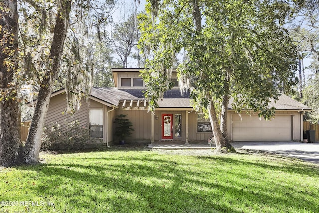 view of front of house featuring a garage, a shingled roof, a front lawn, and concrete driveway