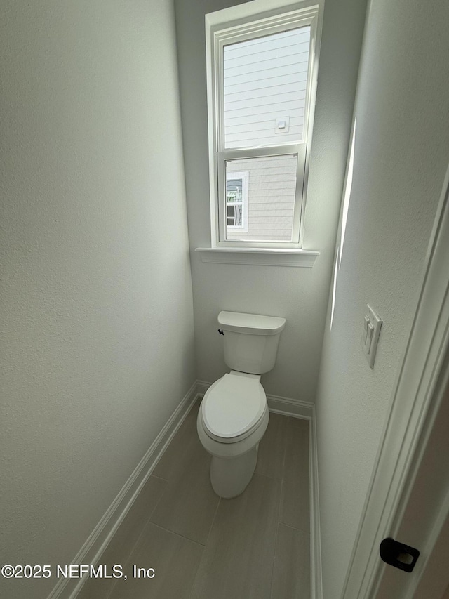 bathroom featuring toilet