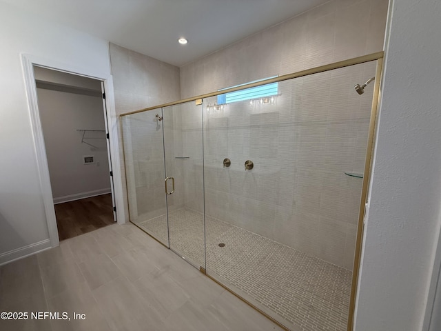 bathroom featuring an enclosed shower