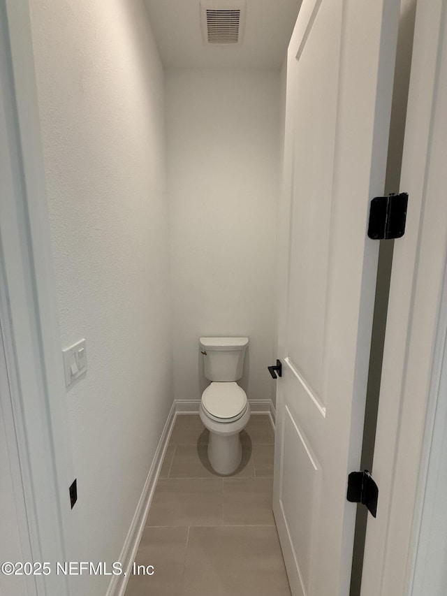 bathroom featuring toilet