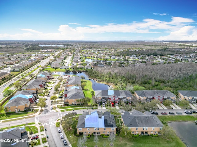 aerial view featuring a water view and a residential view