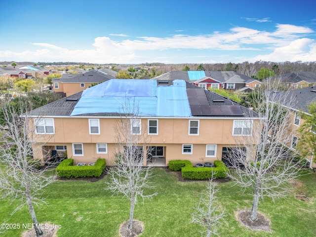 drone / aerial view with a residential view