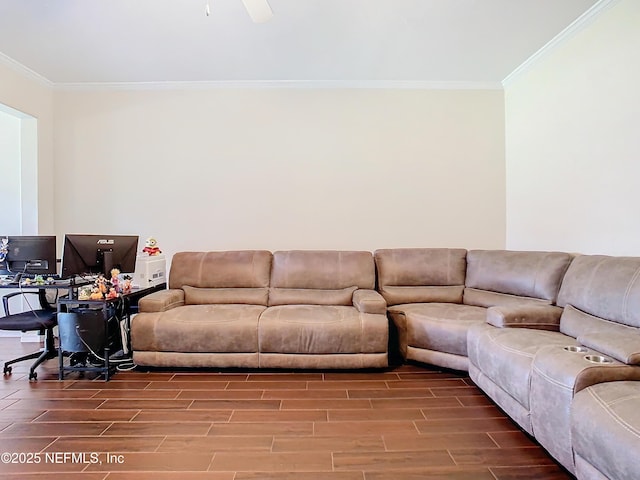 living area with ornamental molding, wood tiled floor, and a ceiling fan