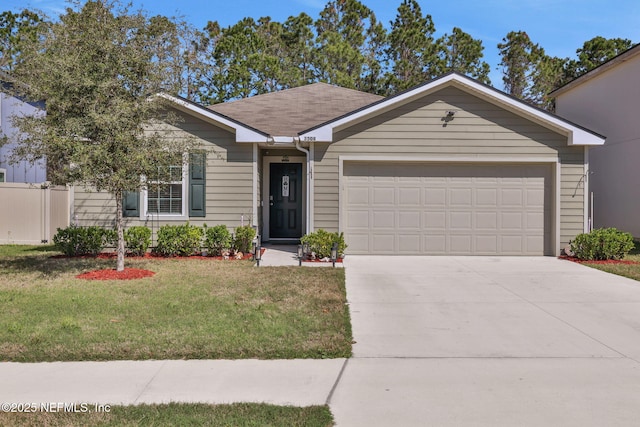 ranch-style home with a garage, fence, a front lawn, and concrete driveway