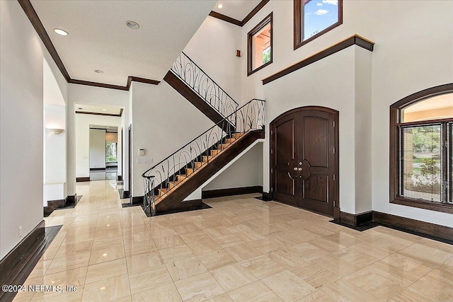 13612 Mcqueens Ct, Jacksonville, FL 32225 - entryway with crown molding