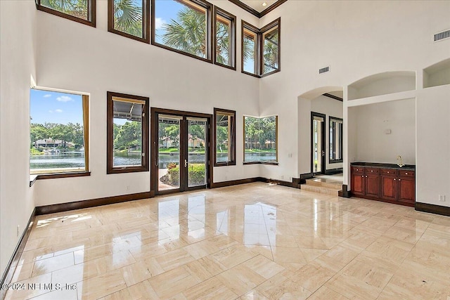 13612 Mcqueens Ct, Jacksonville, FL 32225 - unfurnished living room with french doors