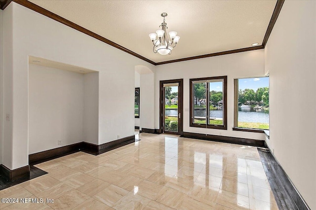 13612 Mcqueens Ct, Jacksonville, FL 32225 - foyer with lofted ceiling, a water view, a textured ceiling, ornamental molding, and a notable chandelier