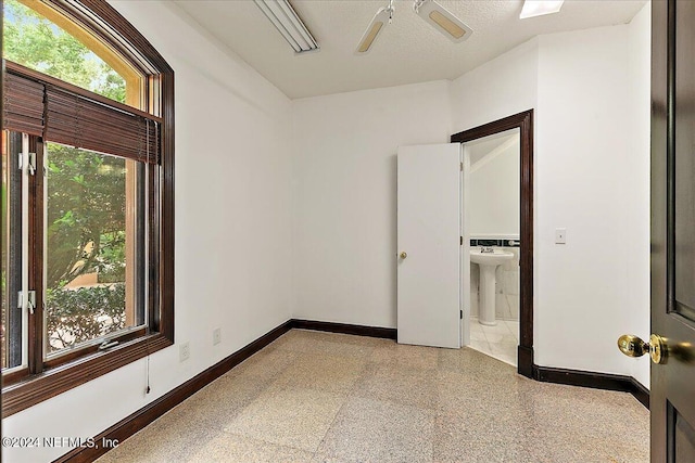 13612 Mcqueens Ct, Jacksonville, FL 32225 - unfurnished room with sink and ceiling fan