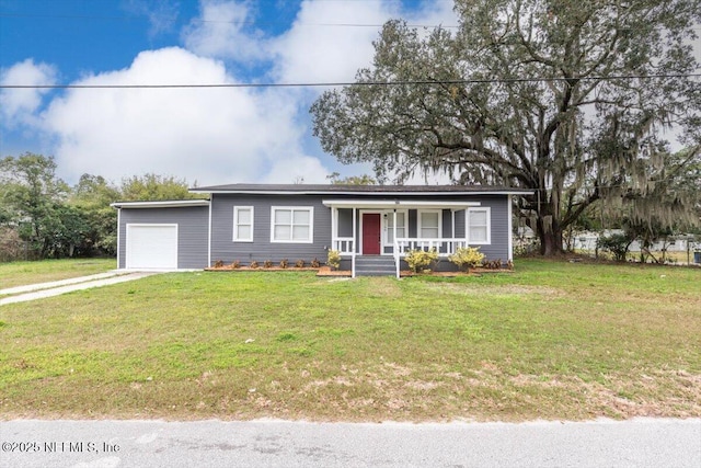 ranch-style home with a porch, a garage, and a front yard