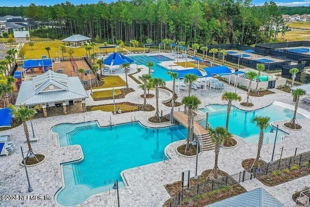 view of pool featuring a water slide