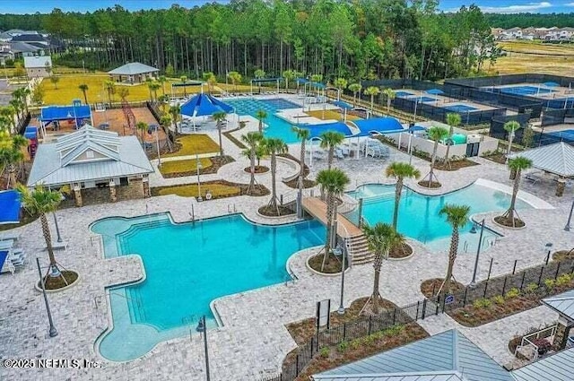 view of swimming pool with a water slide