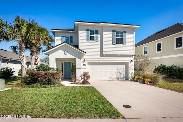 traditional home with a garage, a front yard, and concrete driveway