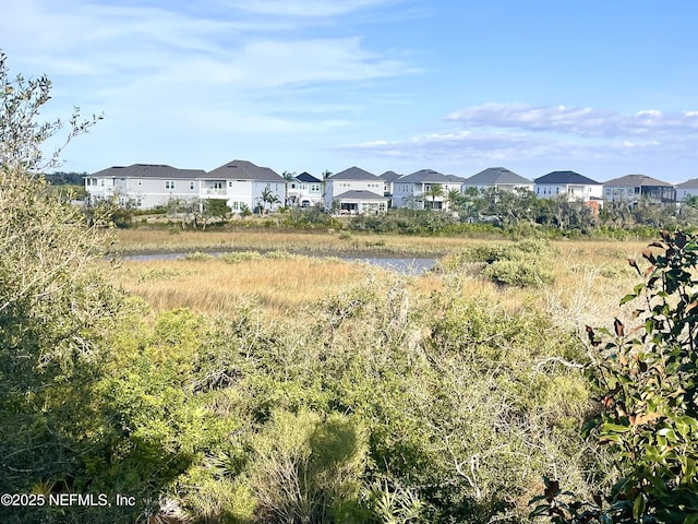 view of mountain feature featuring a water view