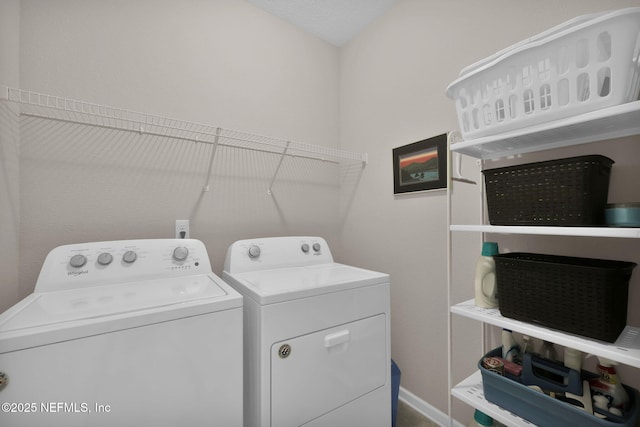 laundry area featuring laundry area and washer and clothes dryer