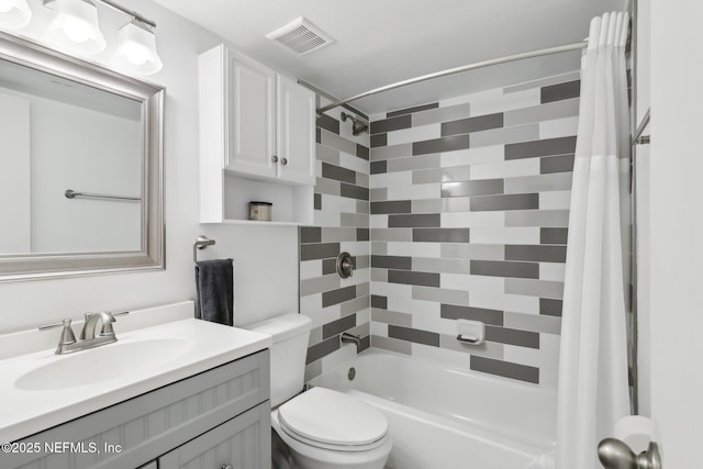 full bathroom featuring shower / bath combination with curtain, vanity, and toilet