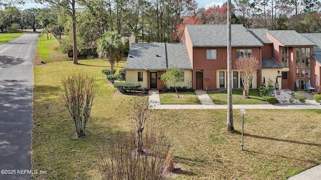 view of front of home with a front lawn