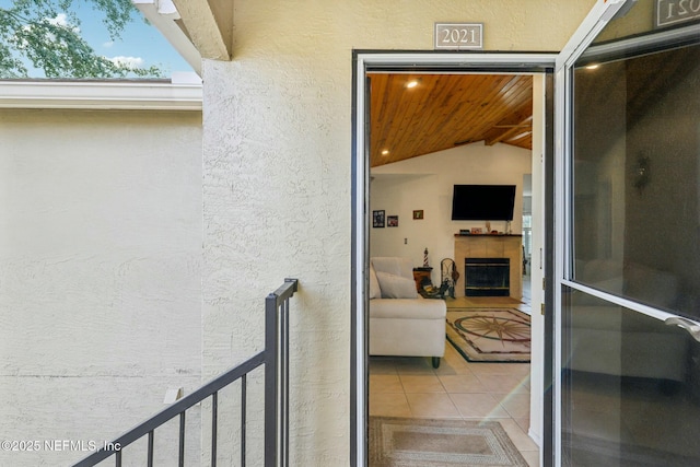 view of exterior entry featuring stucco siding