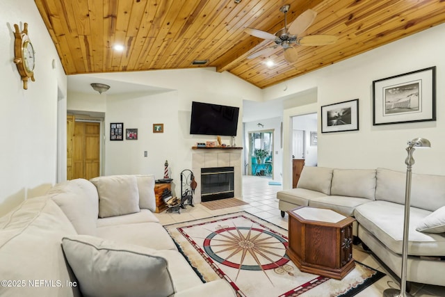 living area featuring tile patterned floors, wood ceiling, a fireplace, and vaulted ceiling with beams