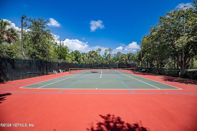 view of sport court with community basketball court and fence