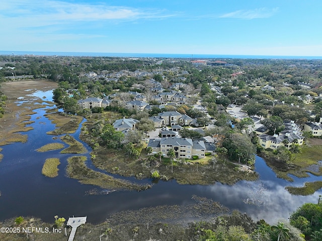 aerial view featuring a water view and a residential view