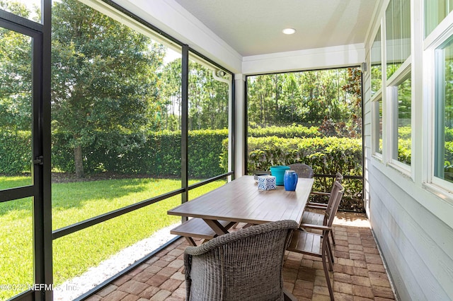 sunroom with plenty of natural light