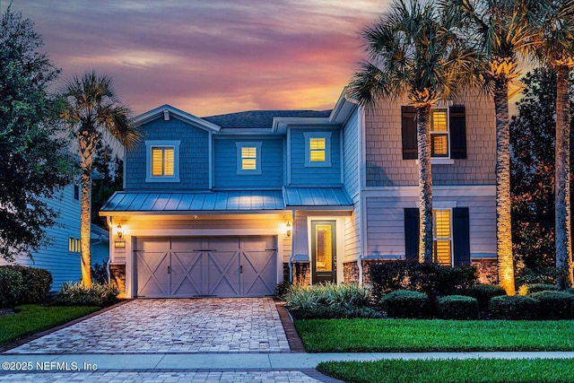 view of front of home featuring a garage