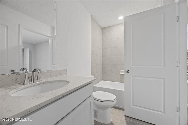 full bathroom with vanity, toilet, and wood finished floors