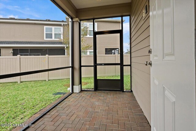 view of unfurnished sunroom