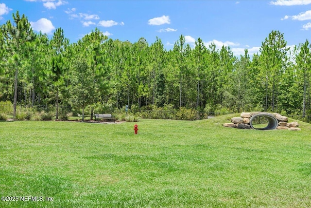 view of yard with fence