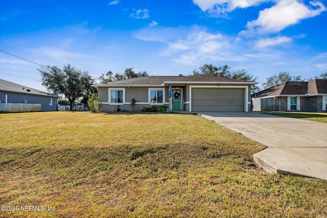 single story home featuring a garage and a front lawn