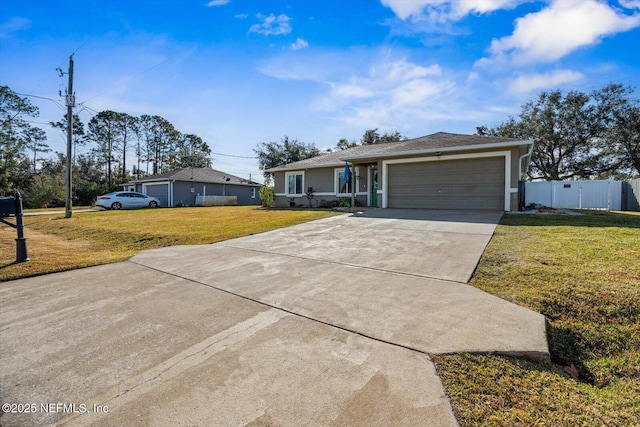 ranch-style house featuring a garage and a front yard