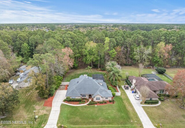 bird's eye view with a view of trees