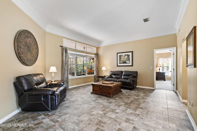 living room with visible vents, plenty of natural light, and baseboards