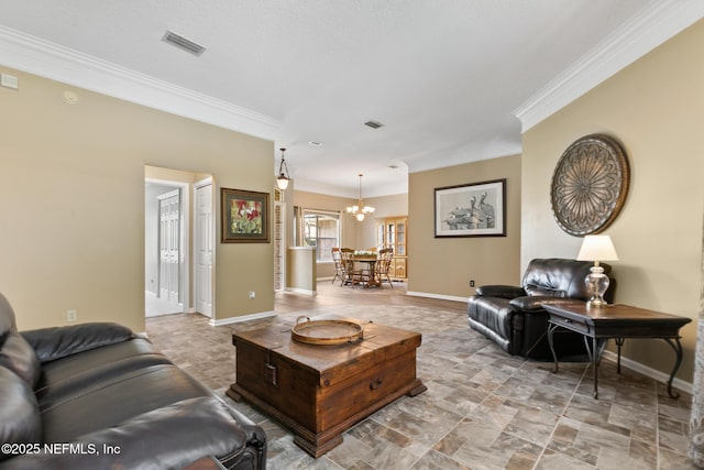 living area with baseboards, visible vents, ornamental molding, stone finish flooring, and a notable chandelier