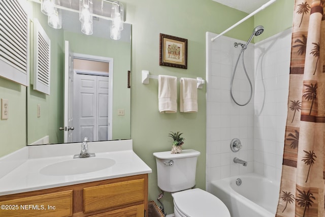 full bathroom featuring toilet, shower / bath combo, and vanity