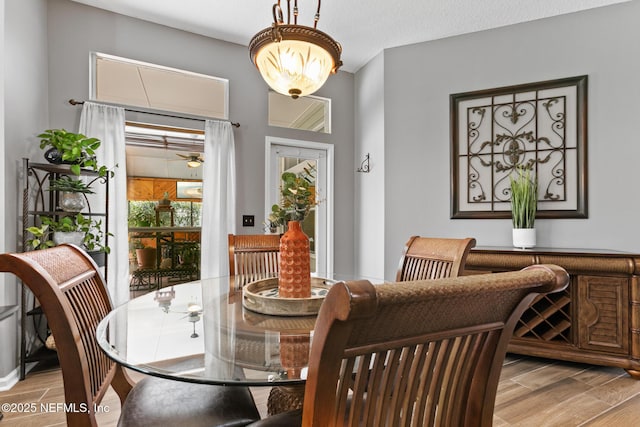 dining room with wood tiled floor