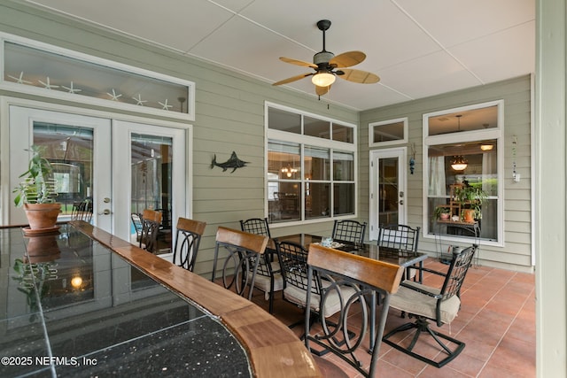 exterior space with ceiling fan and french doors