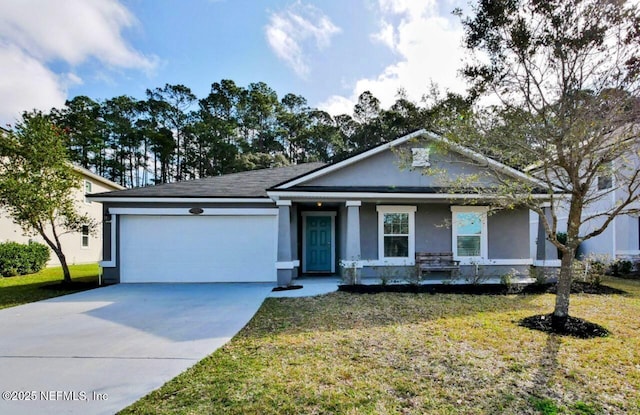 view of front facade featuring a front yard, a garage, and a porch