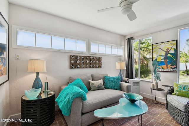 living room with ceiling fan