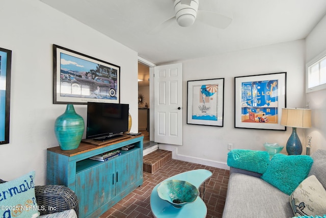 living room with ceiling fan