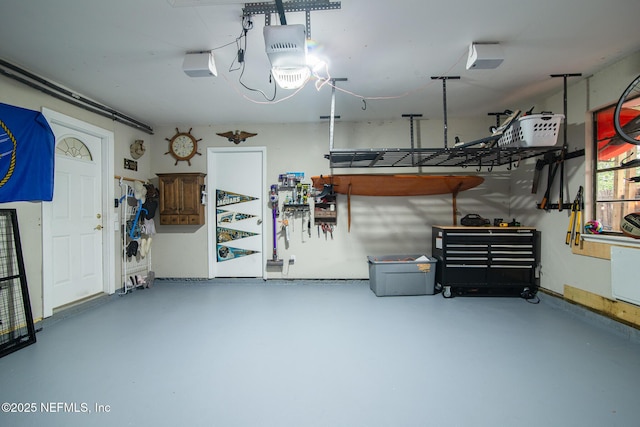 garage featuring a garage door opener